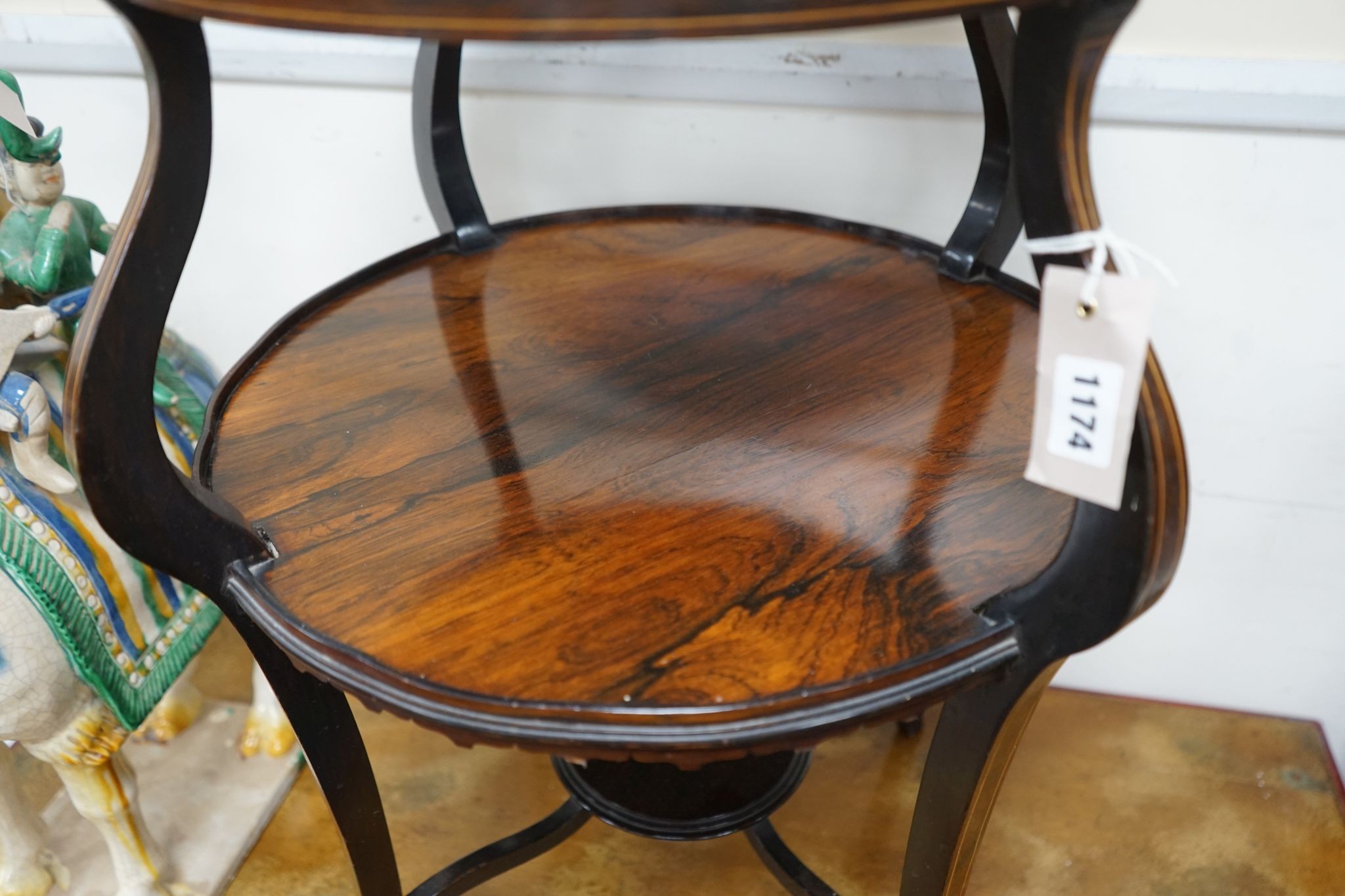 An Edwardian marquetry inlaid rosewood circular two tier centre table, diameter 47cm, height 69cm